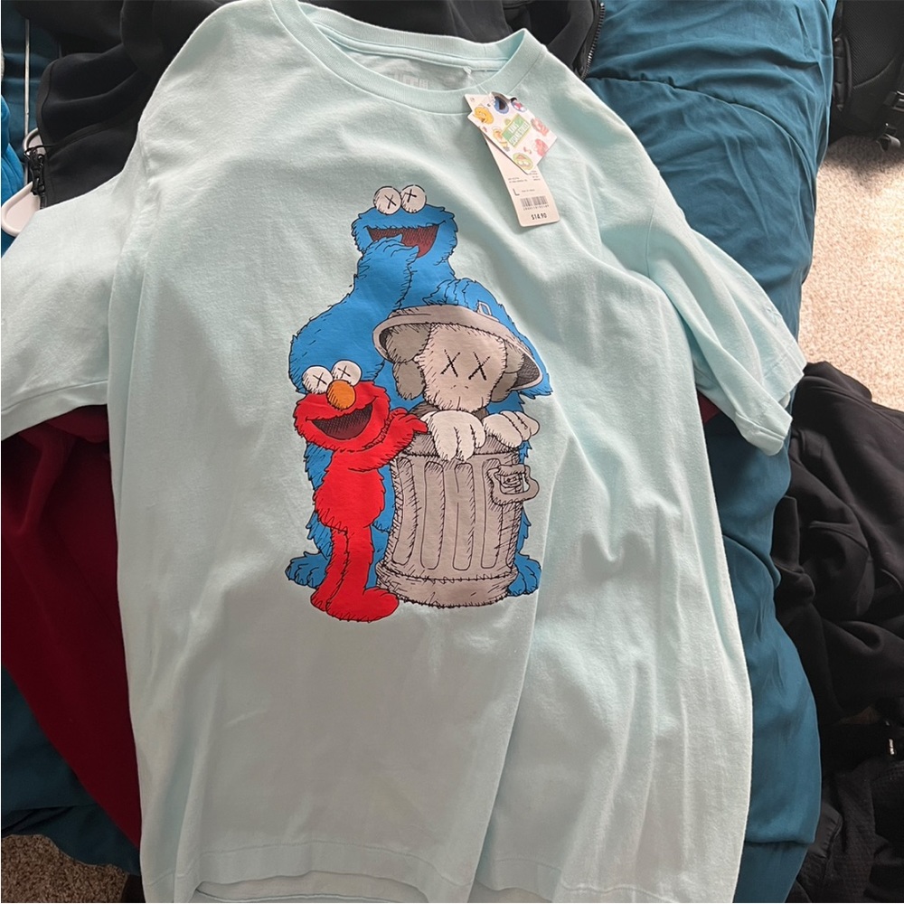 Kaws Sesame Street Uniqlo shirt new/w tags